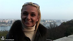 Ivana Sugar is dressed warmly and speaks nicely with a camera guy