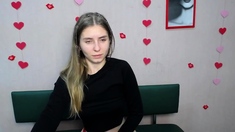 Young Ukrainian blonde in red panties posing on webcam show