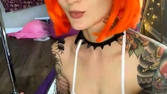 Sexy redhead teen strips and masturbates