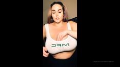 Big ass babe exposes her big boobs
