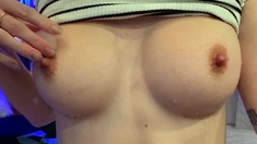 Brunette seductress working her big boobs and hot ass