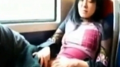 Asian Milf Rubs Her Clit On A Train.