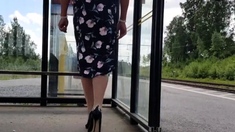 HannaTransa Chastity Crossdresser outdoors at train station.