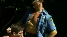 Two Crooked Cops Order This Submissive Guy To Blow Them Both Off